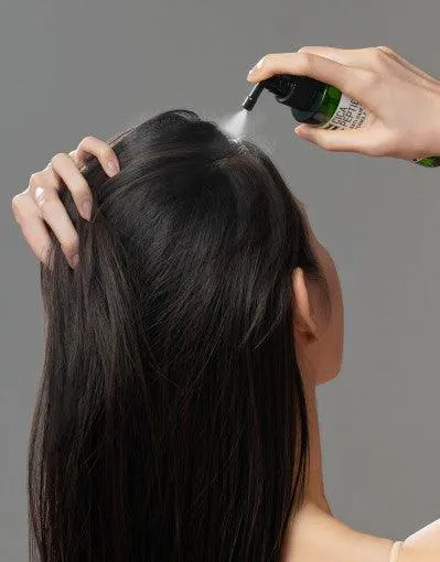menggunakan hair tonic